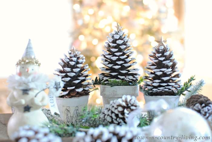 Pinecone Christmas trees centerpiece on table