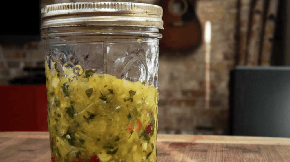 a jar of fermented pineapple salsa