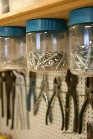 jars storing screws in an organized shed