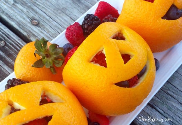 Halloween fruit ideas: orange jack-o-lantern fruit salad