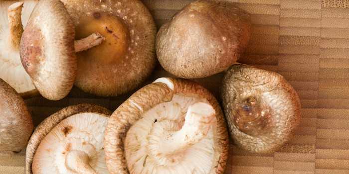 shitake mushrooms on cutting board
