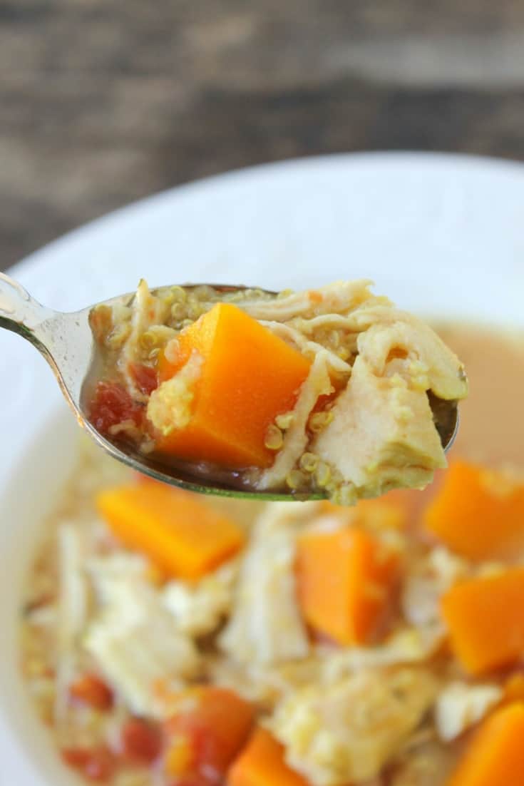 Slow cooker chicken soup with butternut squash and quinoa spoon