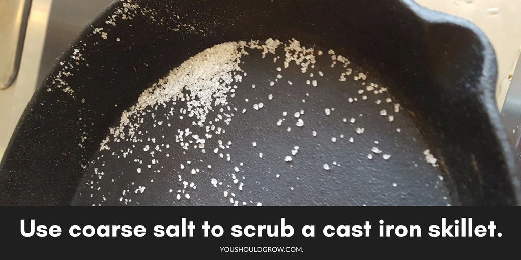 Use coarse salt to scrub a cast iron pan.