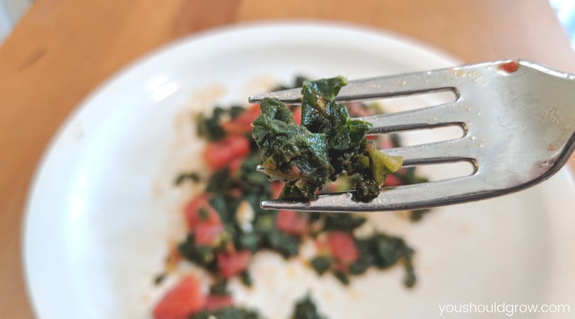 Pumpkin leaves cooked with tomatoes and garlic.