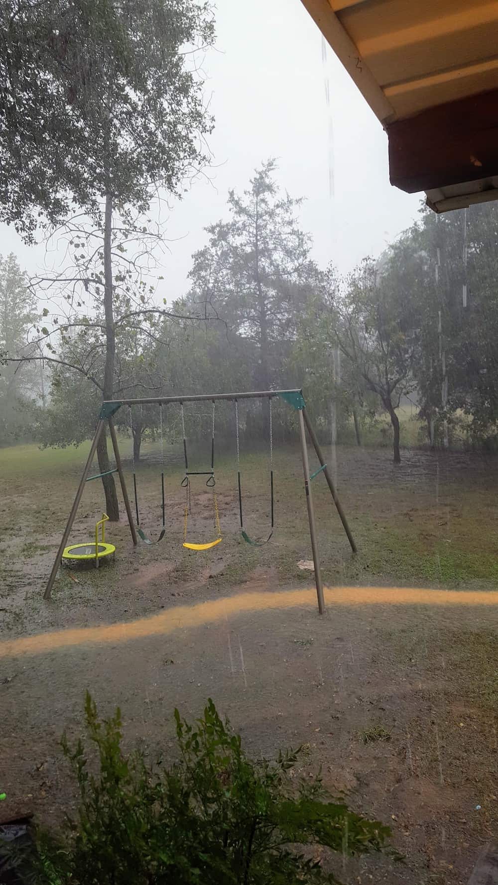 Heavy rain causing flooding in the yard.